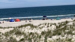 A beach with tents and people. - Oceanfront 12 Bedroom 8 Bath in Ocean City, New Jersey (Ocean City)