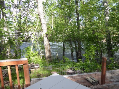 Cozy Getaway in Town! Enjoy Rock Creek Flowing Just Steps from Wrap Round Deck