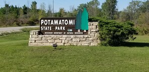 Located near Potawatomi State Park, this property offers access to the surrounding natural area.