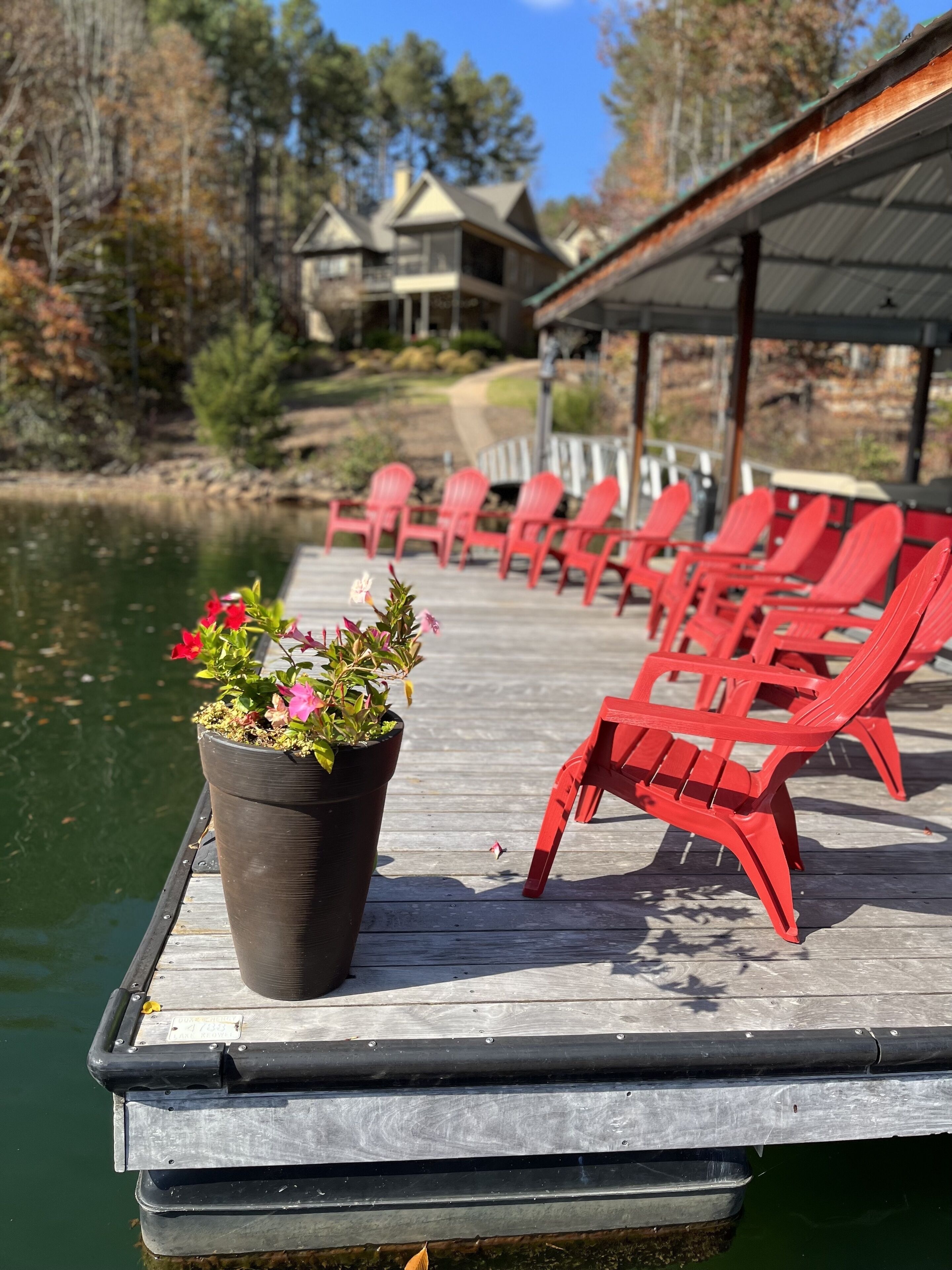 10 Adirondack Chairs. 3 kayaks, 1 stand-up Paddle Board.