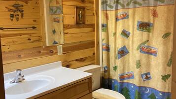 Combined shower/tub, hair dryer, towels, soap