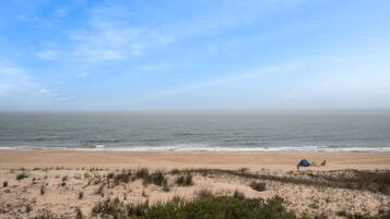 Na praia, toalhas de praia