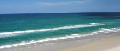 On the beach, sun loungers, beach towels