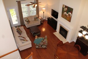 Living area | TV, fireplace, books