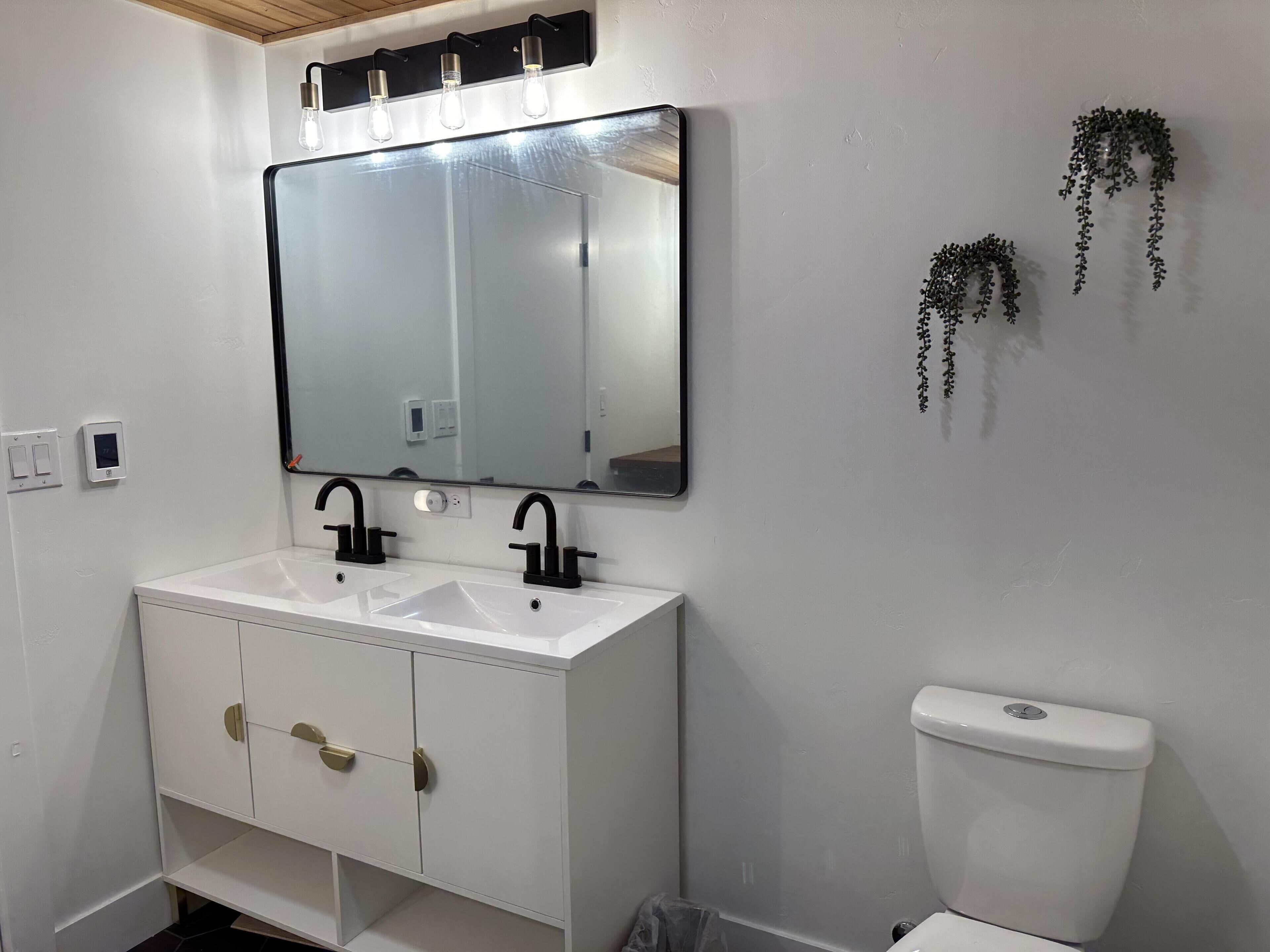 A newly renovated bathroom with heated tile floors to keep your toes happy!