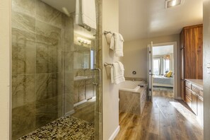 Bathtub, hair dryer, towels, soap
