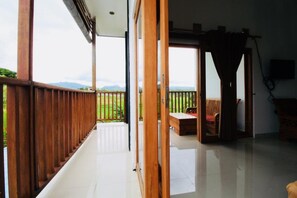 Kamar Standar, 1 Tempat Tidur King, Bebas Asap Rokok, pemandangan kebun | Tempat tidur lipat/tambahan dan Wi-Fi gratis