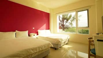 Economy Quadruple Room | Desk, blackout drapes, free WiFi, bed sheets