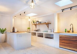 Fridge, microwave, coffee/tea maker, toaster