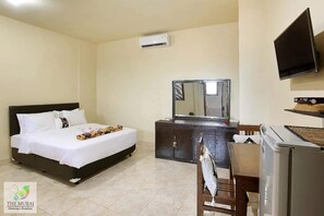 Minibar, desk, bed sheets