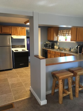 Fridge, microwave, oven, stovetop. Cozy Cabin In Twin Falls