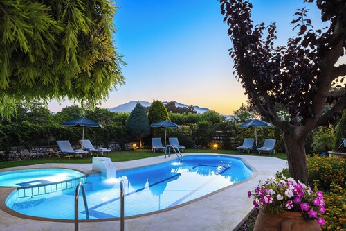 Escape to Blooming Gardens & Village Charm!