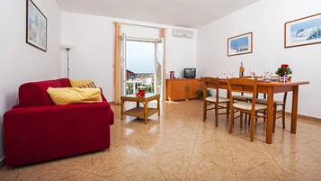 Apartment, 2 Bedrooms, Balcony (A4) | 1 bedroom, premium bedding, in-room safe, desk