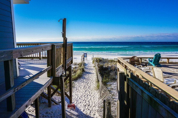 On the beach, sun-loungers