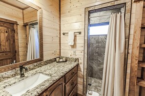 Combined shower/tub, hair dryer, towels, soap