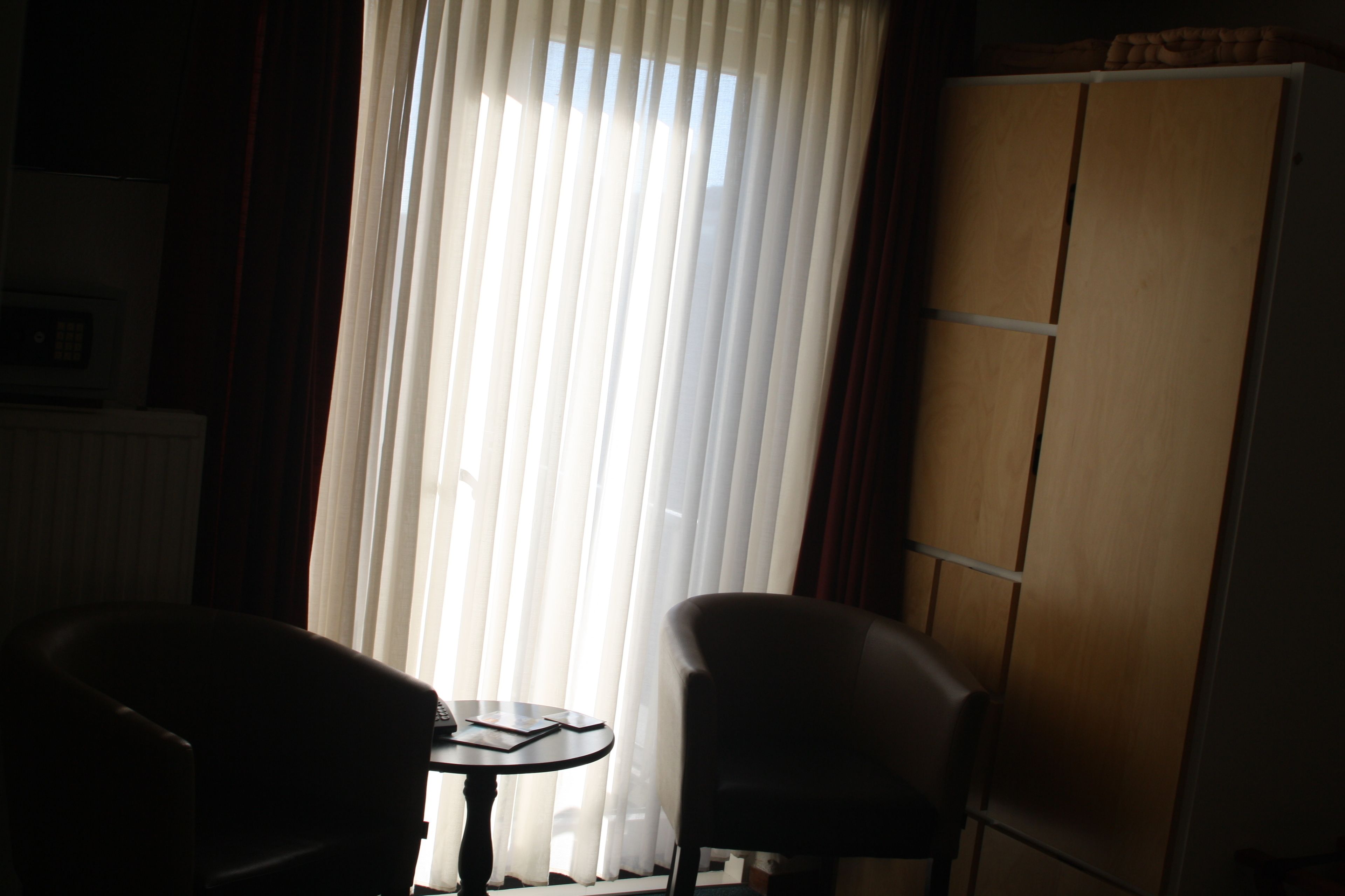 standard double or twin room | living area | flat-screen tv