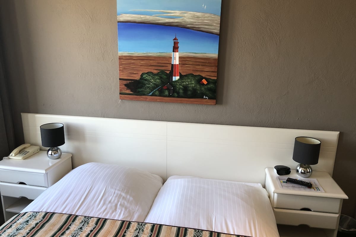 basic double or twin room, ocean view | in-room safe, blackout curtains, iron/ironing board, free wifi