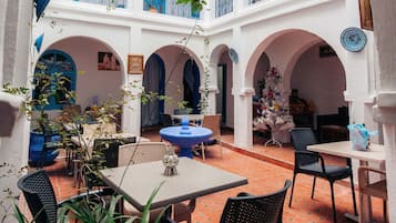 Breakfast, lunch, dinner served; local cuisine