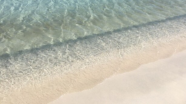 A clear view of a beach with turquoise water and a sandy shore. - "DESSANAI"
Villa with private garden, 5 minutes from the beach (Porto Ottiolu Budoni)