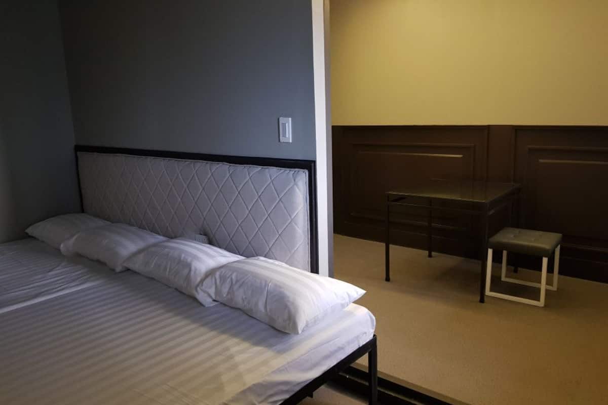 family room, non smoking, city view | desk, blackout curtains, free wifi, bed sheets