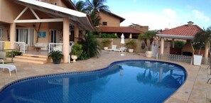 Outdoor pool, pool umbrellas, sun loungers