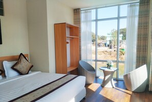 Deluxe Double or Twin Room, River View | Minibar, desk, free WiFi