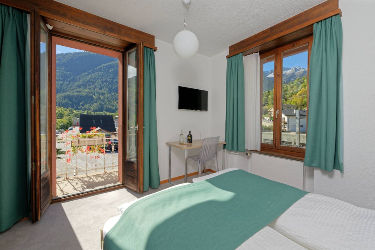 double or twin room, private bathroom, mountain view | hypo-allergenic bedding, down duvets, blackout curtains, rollaway beds