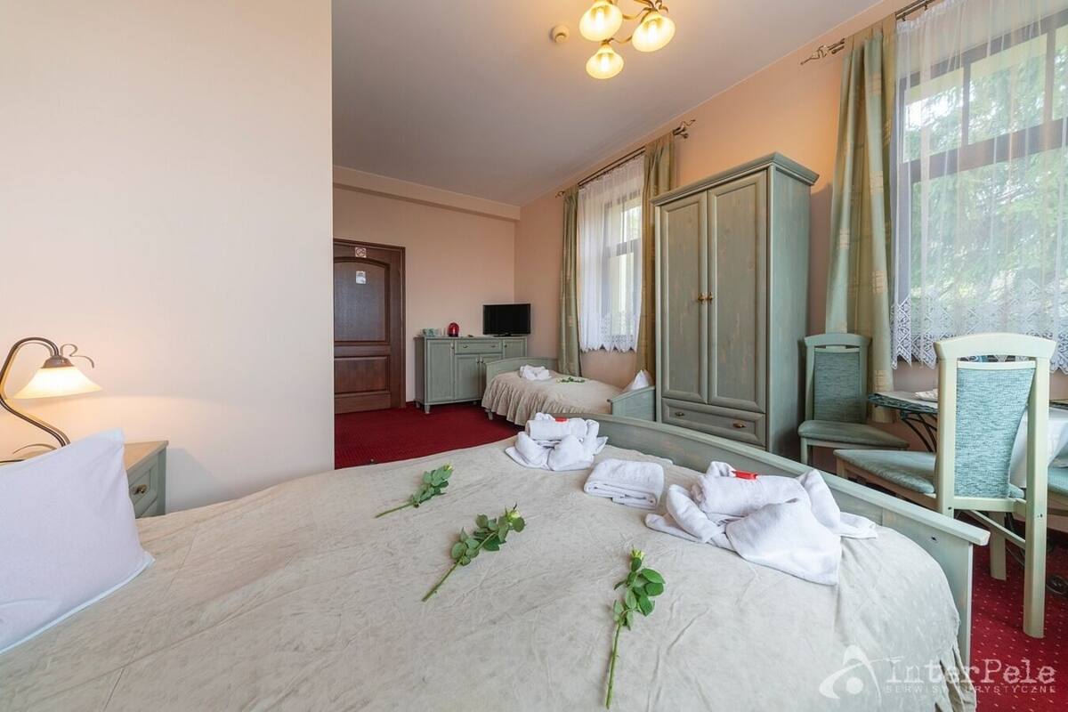 Family Triple Room | 1 bilik tidur, peralatan tempat tidur premium, dihias secara berasingan