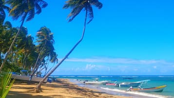 On the beach, white sand, beach towels