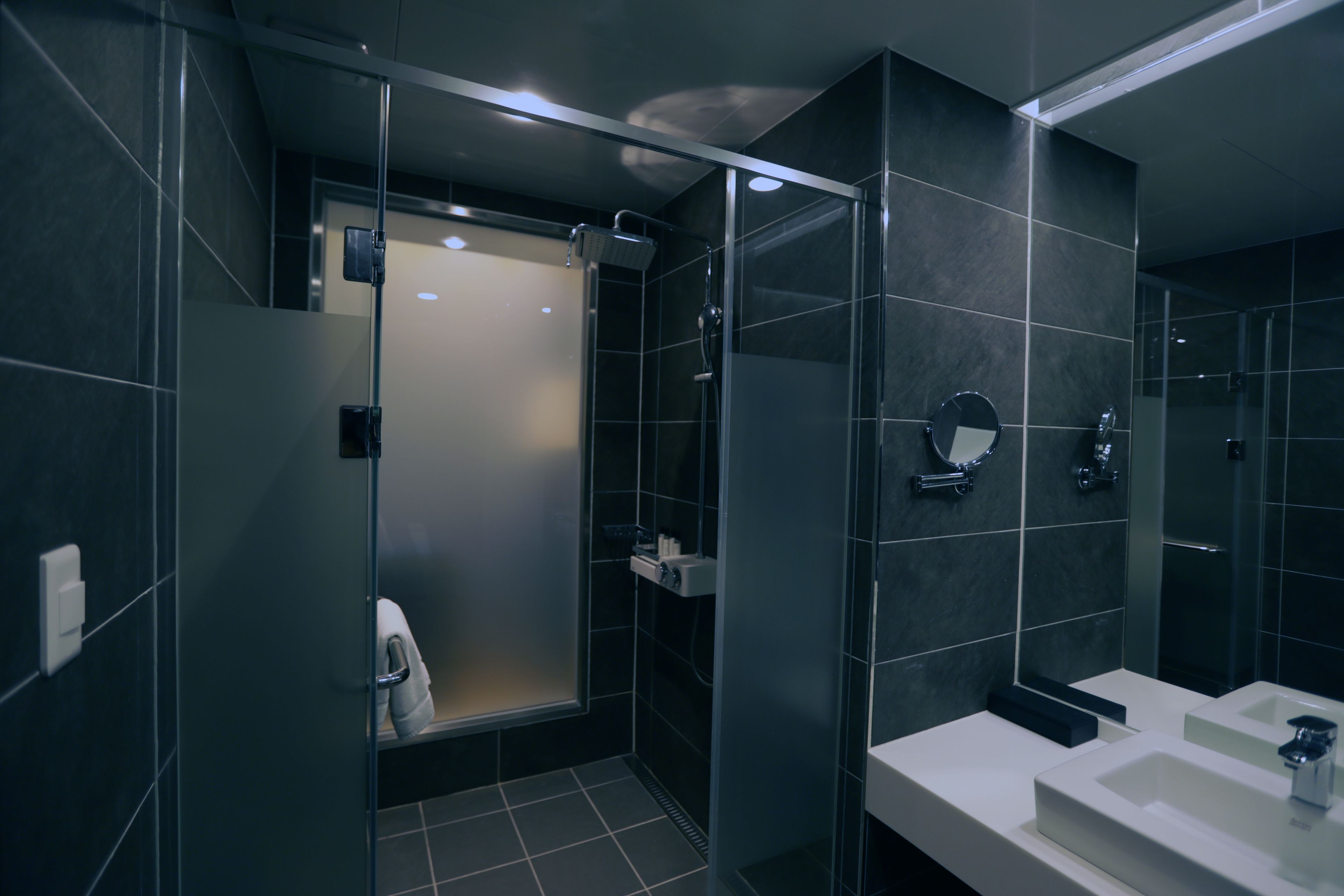 deluxe triple room | bathroom | shower, hair dryer, bidet, towels