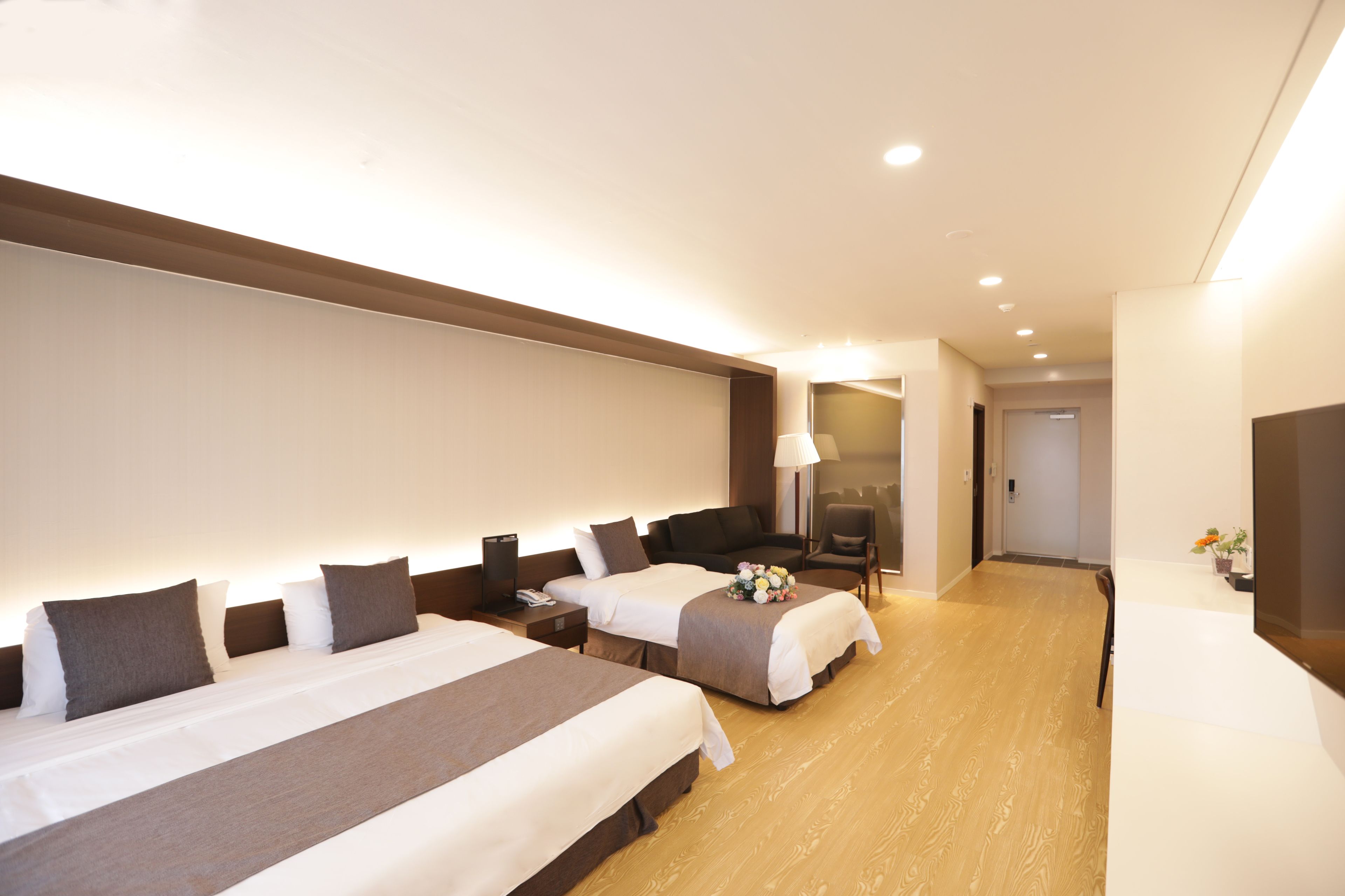 family twin room | in-room safe, desk, laptop workspace, blackout curtains