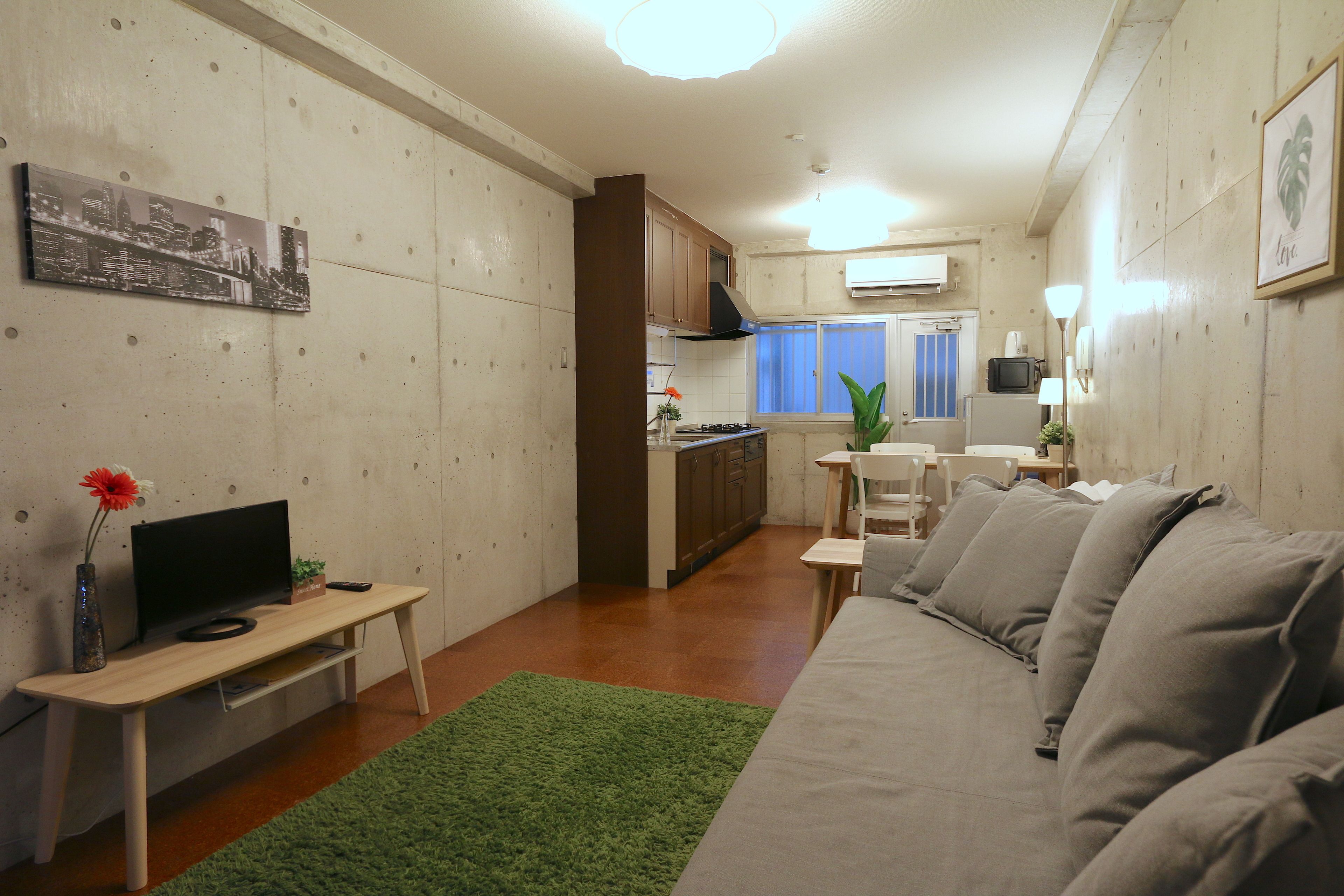 Premier villa room | Living room | Flat-screen TV