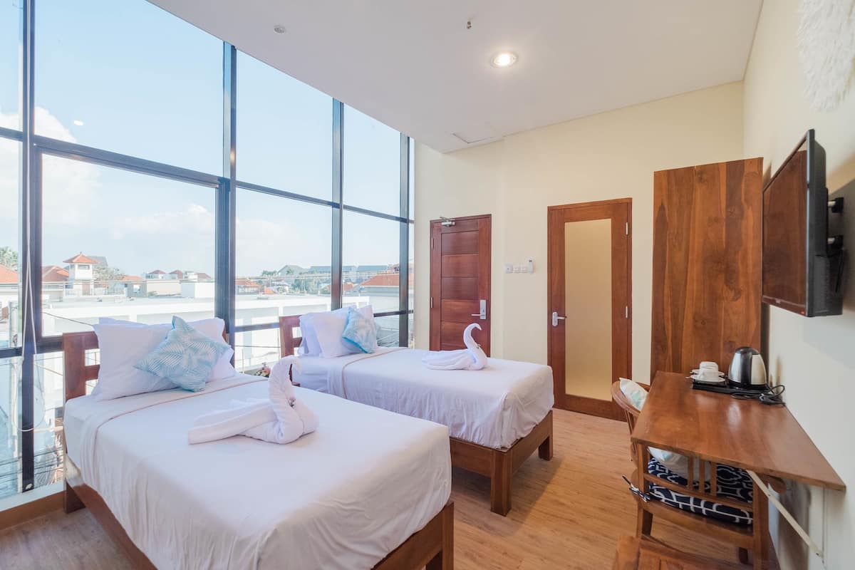 Quarto duplo superior | Frigobar, cofres nos quartos, escrivaninha, Wi-Fi de cortesia