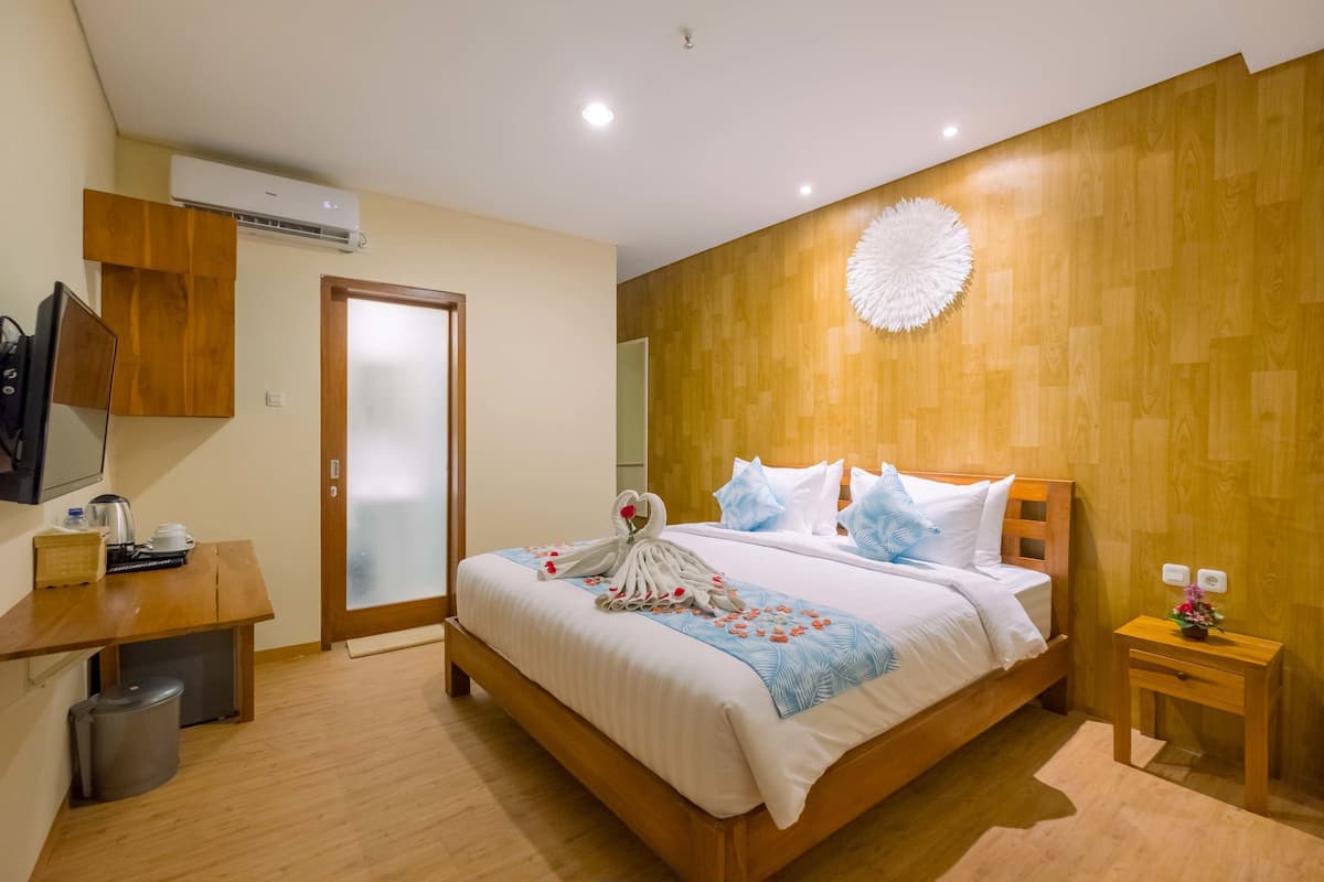 Quarto família, 1 cama King, acesso à piscina | Frigobar, cofres nos quartos, escrivaninha, Wi-Fi de cortesia