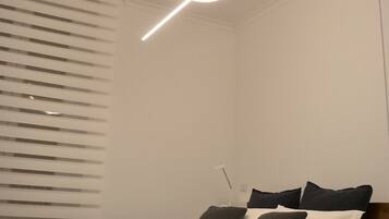 Suite, Non Smoking, City View | Premium bedding, down comforters, memory foam beds, free minibar items
