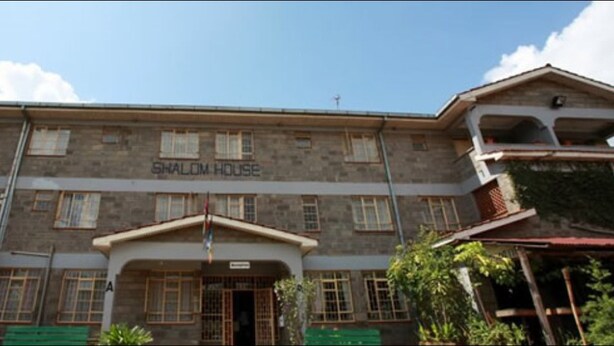 A building with a sign reading "SHALOM HOUSE". - Shalom House - Hostel (Nairobi)