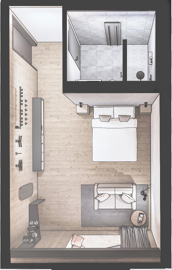 Un apartamento estudio compacto con kitchenette, una cama, zona de estar y baño.