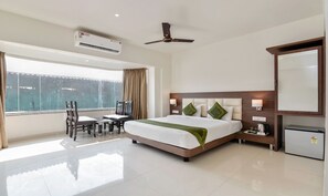 Deluxe Room, 1 Queen Bed, Non Smoking | Iron/ironing board, rollaway beds, free WiFi, bed sheets - Treebo Trend Staycation Holiday (Navi Mumbai)