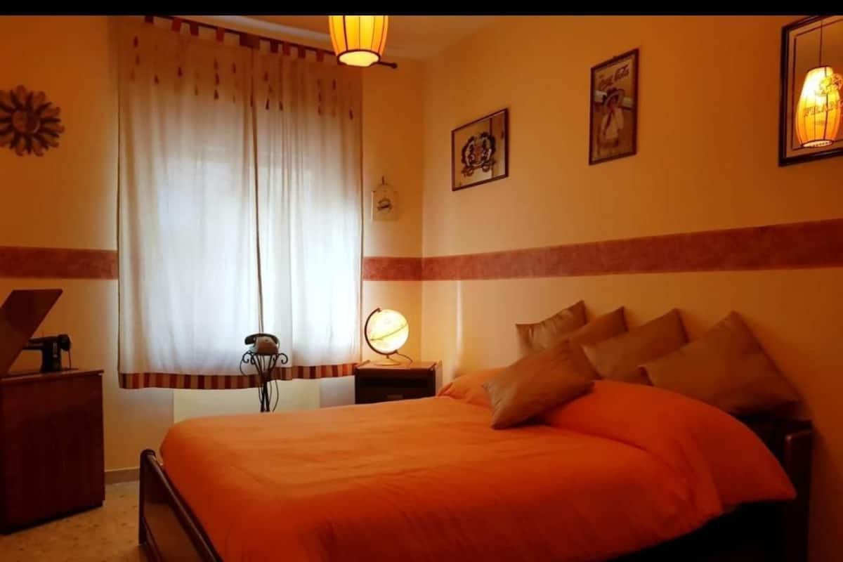 Basic Double Room, 1 Queen Bed, Shared Bathroom (Matrimoniale) | Premium bedding, blackout drapes, iron/ironing board