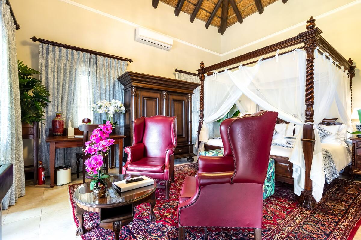 Honeymoon Suite | In-room safe, desk, iron/ironing board (on request), cribs (free)
