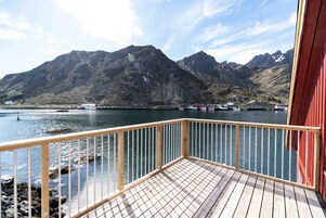 Apartamento premium, várias camas, para não fumantes, vista parcial para o mar | Sacada