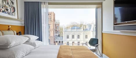 Premium bedding, down duvets, memory-foam beds, in-room safe