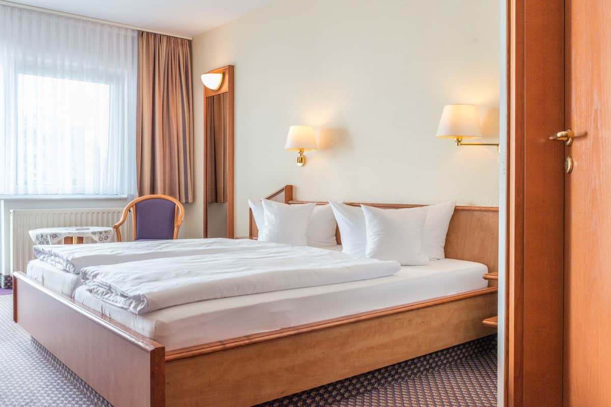 Desk, rollaway beds, free WiFi, bed sheets