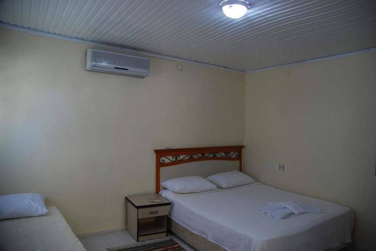 Triple Room, Multiple Beds, Non Smoking | Free WiFi, bed sheets