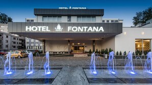 A modern hotel facade with the name "HOTEL FONTANA" prominently displayed. - Hotel Fontana (Vrnjacka Banja)