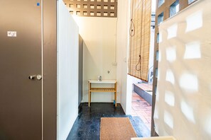 Shower, free toiletries, hair dryer, slippers