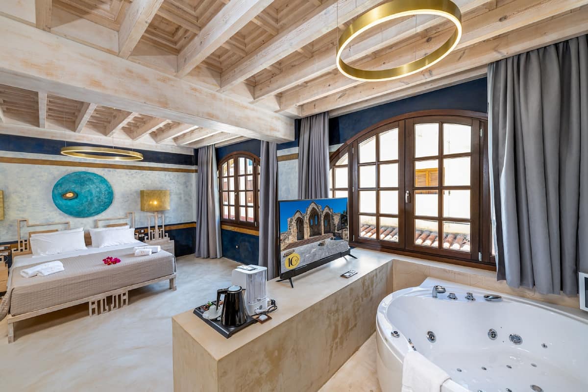 Superior Suite Lindos with Hot Tub | 1 bedroom, down comforters, minibar, in-room safe