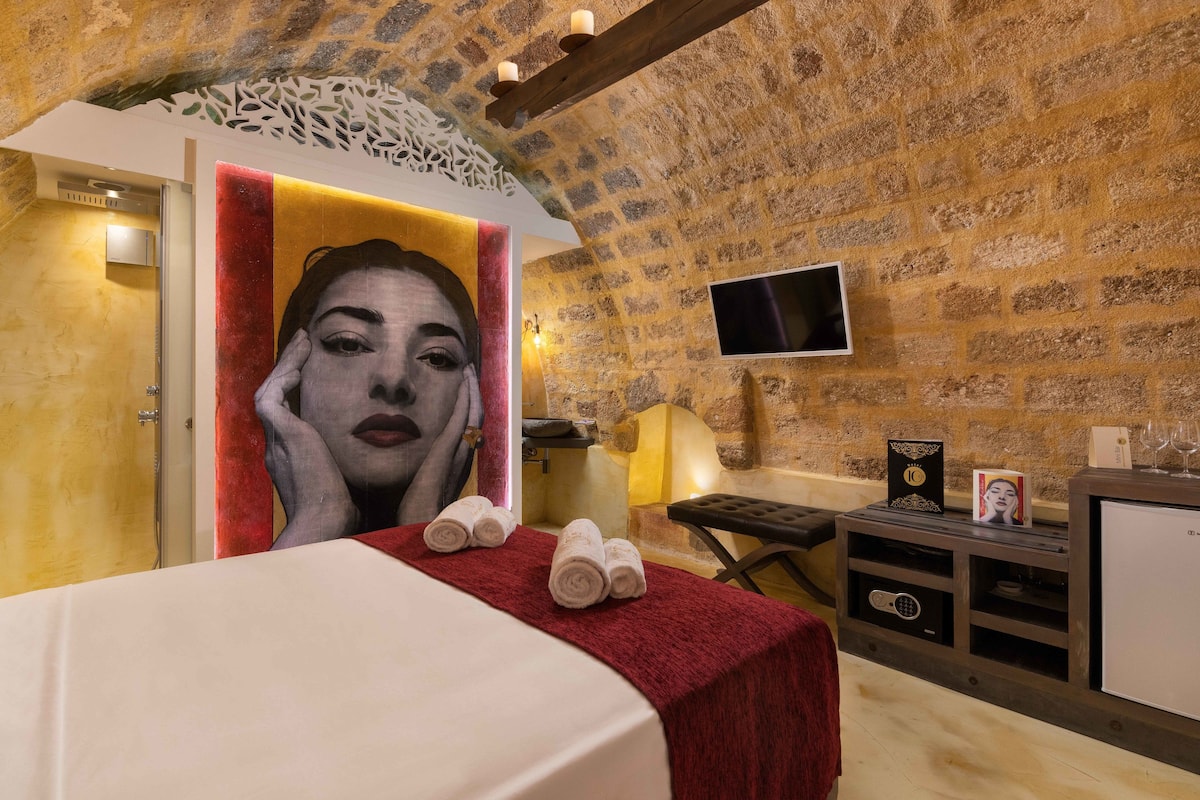 Deluxe Stone Room | 1 bedroom, down comforters, minibar, in-room safe