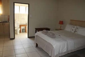 Suite de lujo, para no fumadores | Escritorio, cortinas blackout, cunas gratuitas y ropa de cama