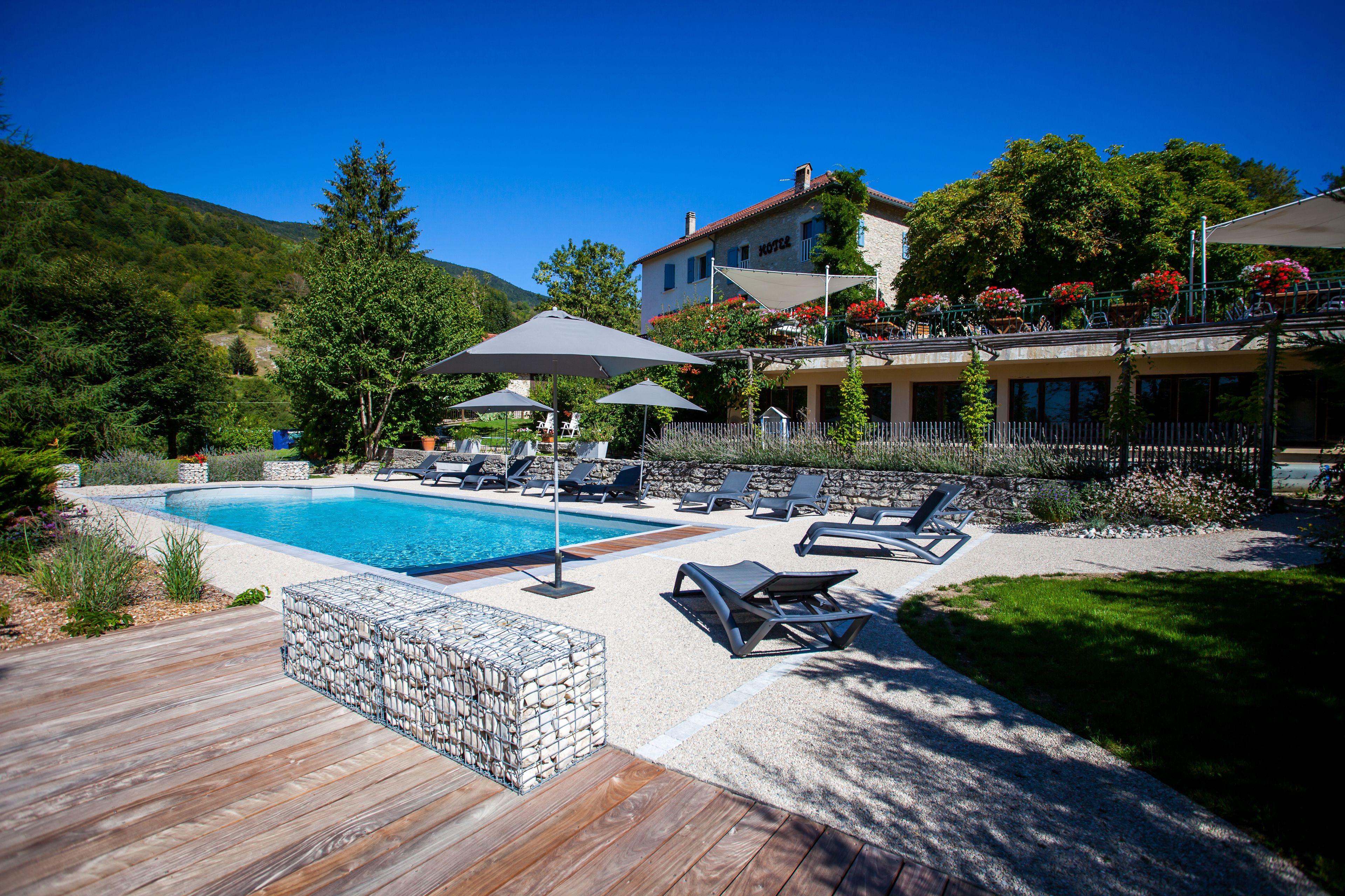 seasonal outdoor pool, open 8:00 am to 11:00 pm, pool umbrellas